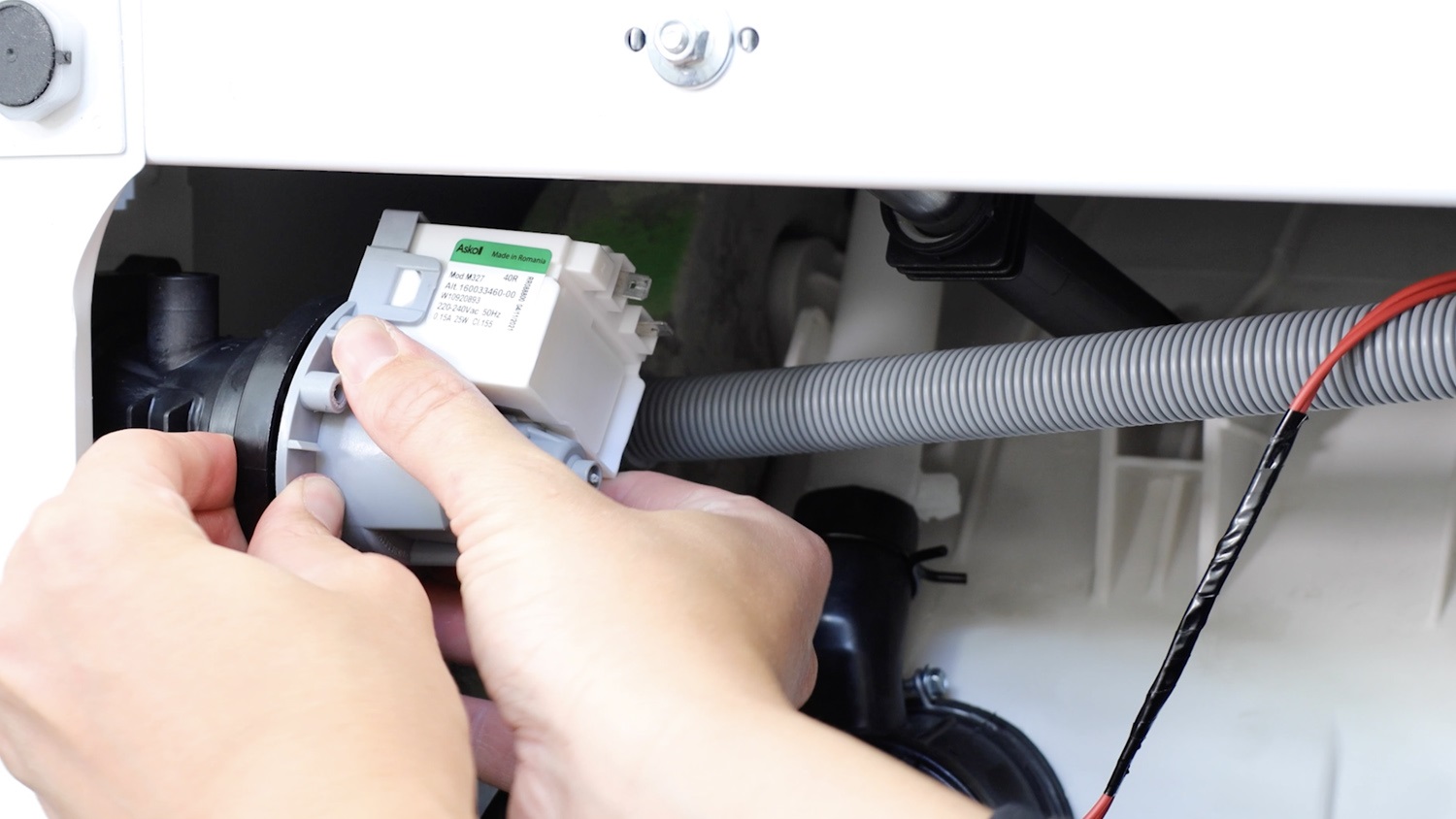 Attach drain pump to washing machine filter housing